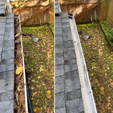 Cleaning-the-gutters-and-downspouts-to-prevent-water-overflow 0